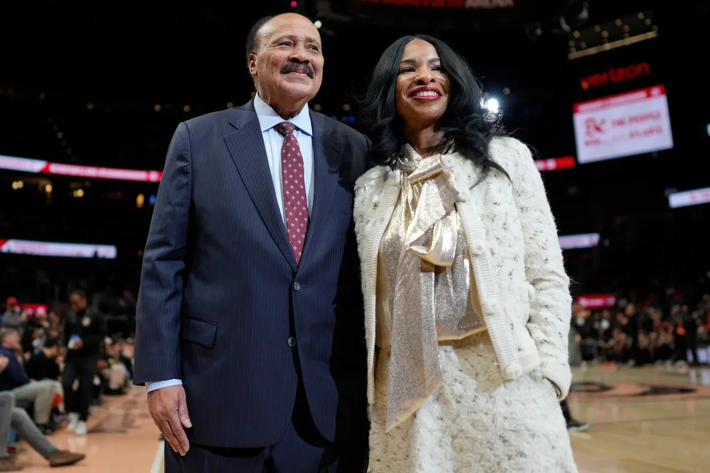 Martin Luther King II, and his wife Arndrea Waters King smile during the second half of an NBA basketball game between the Atlanta Hawks and the Milwaukee Bucks, Monday, Jan.
19, 2026, in Atlanta. (AP Photo/Mike Stewart)